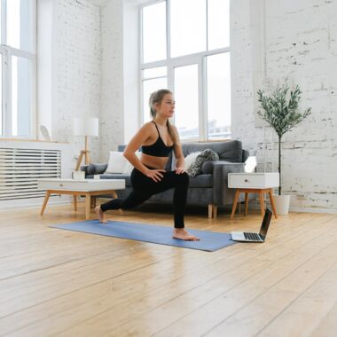 Relaxing Yoga Practice at Home - Woman Doing Morning Yoga